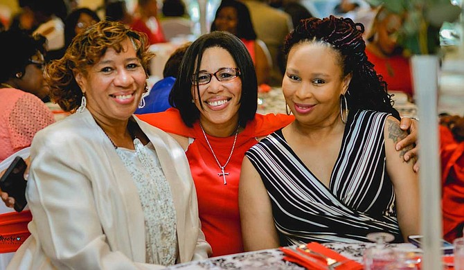Leshundra Young (right) poses for a photo with mother Mattie Porter (left) and sister Rev. Cassandry Redmond-Keys (center). Photo courtesy Leshundra Young