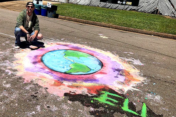 Eli Childers has created chalk art for businesses and events such as Vibe Fest in April. Photo courtesy Eli Childers