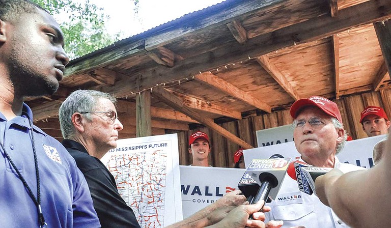 Media gathered around Bill Waller Jr. at the Neshoba County Fair in August 2019. But the meaningful substance of his platform seldom broke through. Photo by Ashton Pittman