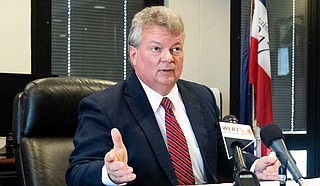 Mississippi Attorney General Jim Hood speaks to reporters during a press conference in his office in downtown Jackson, Miss., on Sept. 4, 2019. Hood responded to U.S. District Court Judge Carlton W. Reeves' ruling that Mississippi is violating the civil rights of residents with mental-health issues. Photo by Seyma Bayram