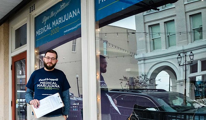 Jonathan Brown, who is heading Mississippi's Medical Marijuana 2020 signature drive, and activist Ashley Durval registered the initiative last year. The group has turned in more than 105,000 signatures to get the initiative on the ballot next year. Photo by Ashton Pittman