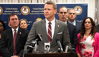 United States Attorney D. Michael Hurst Jr. (center) announces the launch of a new statewide Mississippi Human Trafficking Council from his office in the Thad Cochran Federal Courthouse in Jackson, Miss., on Sept. 10, 2019. Photo by Seyma Bayram