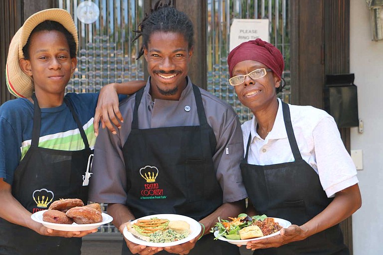 Salu Binahtabor, D.J. Baker and Felicia Bell are partners at Eritaj Cookery, a Restorative Food Cafe in the Kundi Compound in midtown. Photo by Rebecca Burr