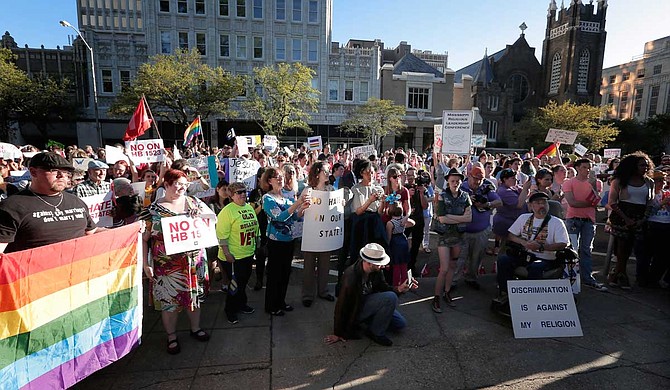 Hundreds of activists gathered outside the governor's mansion in downtown Jackson in April 2016 to protest Mississippi's "religious liberty" law, H.B. 1523, which granted business owners the right to discriminate against LGBT people based on religious beliefs or "moral convictions." Photo by Imani Khayyam