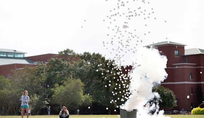 SMACS "Demos on the Drill Field" event will present chemistry demonstrations including the "screaming gummy bear," multi-colored flame tests, a liquid nitrogen cloud and an eruption of ping pong balls. Photo courtesy Megan Bean/MSU