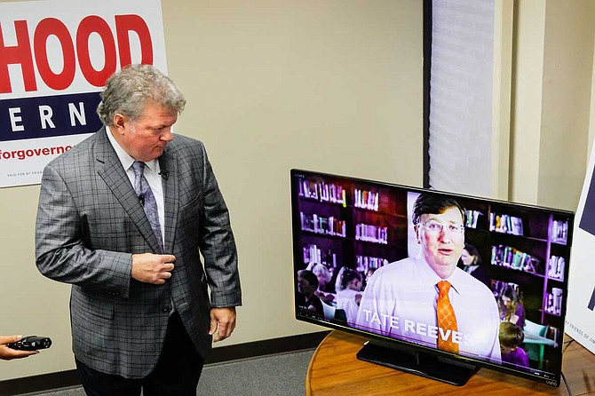 Mississippi Attorney General Jim Hood, the Democratic nominee for governor, watches while an aid plays an education ad from Republican opponent Tate Reeves that Hood calls "fraudulent." Photo by Ashton Pittman.