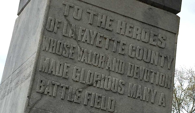 A towering monument to the Confederacy stands guard over the entrance of the University of Mississippi. Many students and professors want it moved. Photo by Donna Ladd