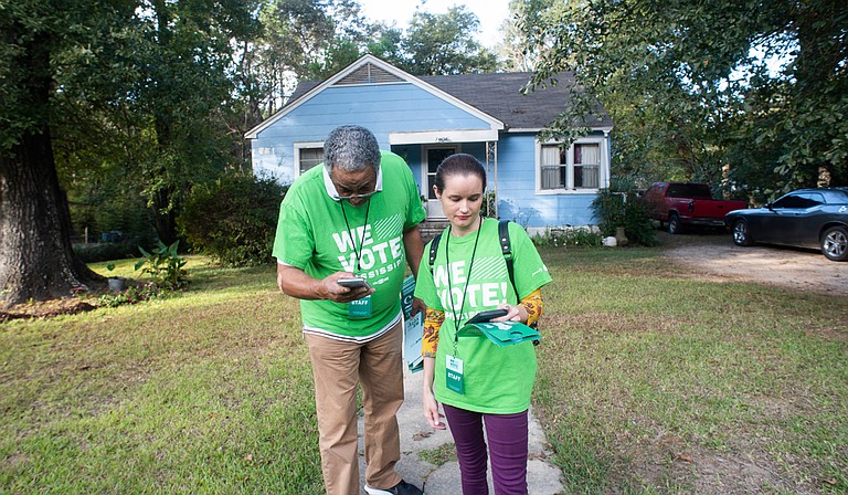 “We Vote! Mississippi” canvassers last week going door-to-door to let Mississippians know the stakes of Nov. 5. Photo by Roy Adkins.