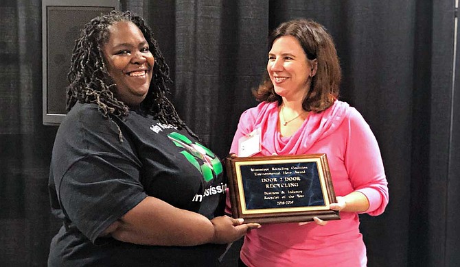 Faith Young (left) with a representative of the Mississippi Recycling Coalition Photo courtesy Faith Young