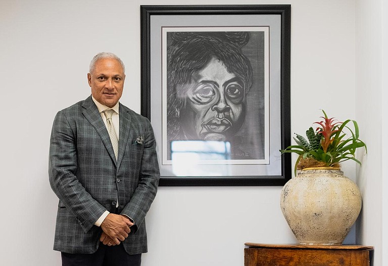 Mike Espy gave the Jackson Free Press a tour of his work office in 2018, where hangs a portrait of historic Mississippi civil rights leader Fannie Lou Hamer—one of his personal heroes. Photo by Ashton Pittman