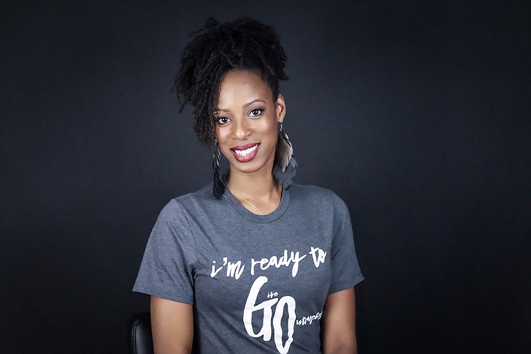 Ebony Jones, founder and executive director of Give Outrageously, works on initiatives to help members of the greater Jackson community. Courtesy Ebony Jones.