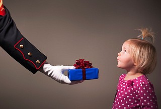 The University of Mississippi hosts a fashion show for Toys for Tots. Courtesy web.