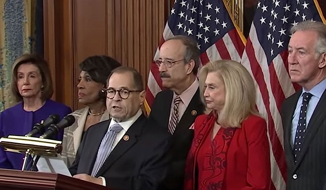 (Left to right) House Speaker Nancy Pelosi, Chairwoman of the House Financial Services Committee Maxine Waters, D-Calif., House Judiciary Committee Chairman Jerrold Nadler, D-N.Y., Chairman of the House Foreign Affairs Committee Eliot Engel, D-N.Y., Chairwoman of the House Committee on Oversight and Reform Carolyn Maloney, D-N.Y., and House Ways and Means Chairman Richard Neal unveil articles of impeachment against President Donald Trump, during a news conference on Capitol Hill in Washington, Tuesday, Dec. 10, 2019. Photo courtesy Cspan