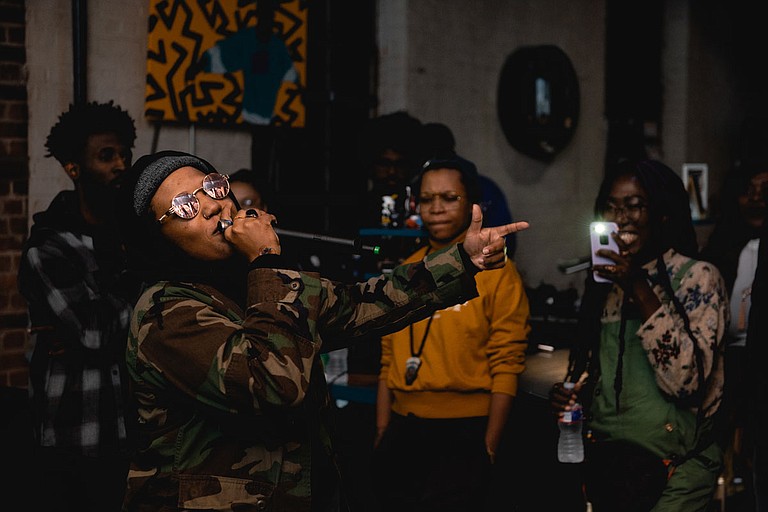 Rapper Unknwn performs for the first time at the 4th Quarter Exchange, a music event that brings artists and consumers face-to-face through performances and networking. Photo by Drew Dempsey