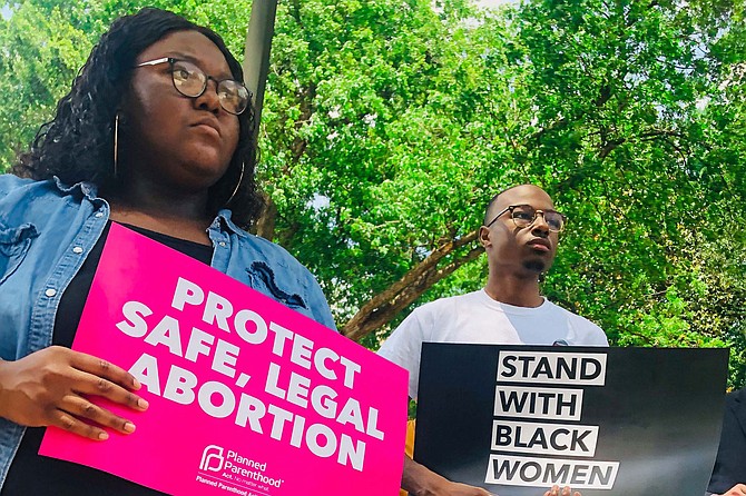 Abortion-rights activists protested against Mississippi’s six-week abortion ban outside the Mississippi Capitol building in May 2019. Photo by Ashton Pittman