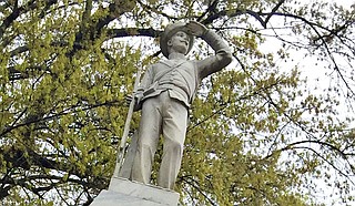 The statue is one of many Confederate monuments erected across the South more than a century ago. Critics say its display near the university's main administrative building sends a signal that Ole Miss glorifies the Confederacy and glosses over the South’s history of slavery. Photo by Donna Ladd