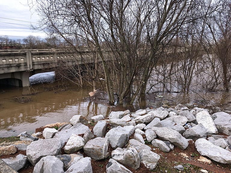 Waters are rising on the Pearl River, as was apparent the morning of Jan. 17 at this Old Brandon Road bridge in downtown Jackson. The National Weather Service predicts "moderate flooding" of the river through the weekend in the area. Photo by Kristin Brenemen