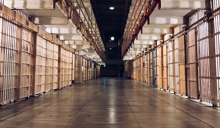 Reaves was at least the 13th inmate to die in Mississippi in the past month. Most of the other deaths occurred at the Mississippi State Penitentiary at Parchman, and many of them happened amid outbursts of violence. Photo by Carles Rabada on Unsplash