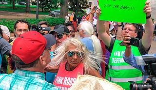An abortion-rights rally outside the Mississippi Capitol building last year drew a moment of chaos when an anti-abortion activist with a bullhorn interrupted a speech. Photo by Ashton Pittman