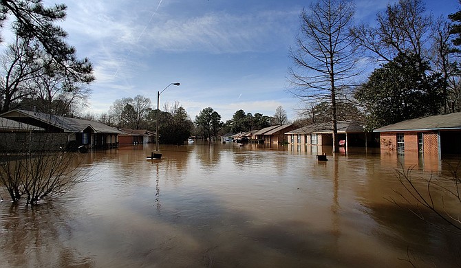 The Pearl River flood affects over 500 homes in the Greater Jackson area, driving residents from their homes for what may be a long evacuation. Emergency responders stressed the danger of even low flood waters. Photo by Nick Judin