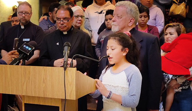 Immigrants and activists like Floribeth Lopez, 11, took to the Capitol last week, imploring legislators and the public to uphold the right of undocumented residents and to reject laws that target them. Photo by Nick Judin