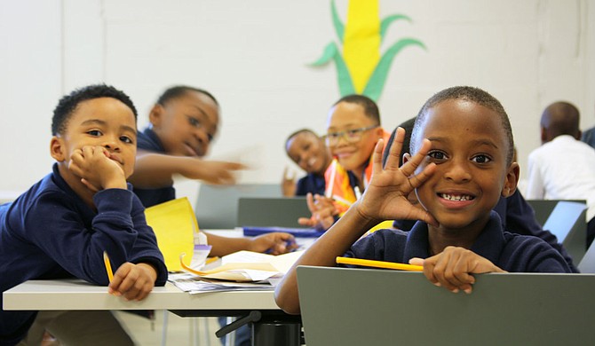 Students use the center to do homework together. Photo courtesy Operation Shoestring