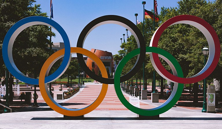 The International Olympic Committee postponed the 2020 Tokyo Olympics until the summer of 2021 at the latest, acting on the recommendation of Japan's prime minister. That could be a heavy economic blow to Japan and could upset athletes' training regimens, perhaps costing some of them a shot at a medal. Photo by Bryan Turner on Unsplash