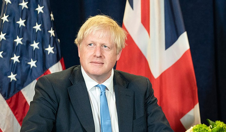 British Prime Minister Boris Johnson's office said he was tested after showing mild symptoms for the coronavirus and is self-isolating and continuing to lead Britain's response to the pandemic. Official White House Photo by Shealah Craighead