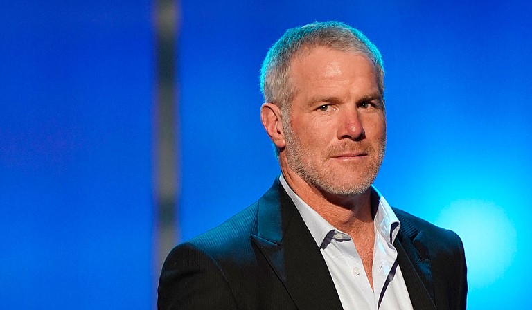 Former NFL quarterback Brett Favre is repaying $1.1 million in welfare money that he received for multiple speeches where he did not show up, the Mississippi state auditor said Wednesday. Photo by Paul Abell Invision for NFL AP Images