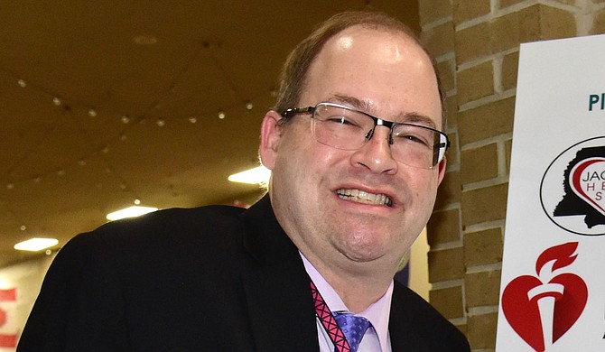 Chris Kochtitzky taking part in the work he loved at the “Move Your Way” event held at the Jackson Medical Mall in February 2019. Photo by Scott Crawford.