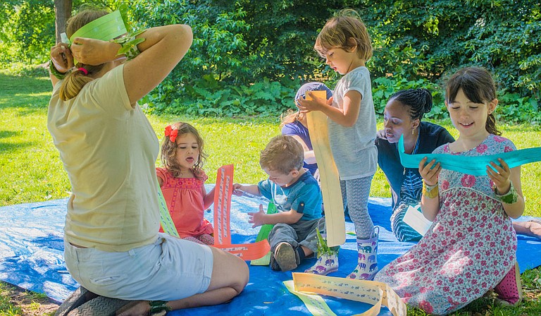 The Tinkergarten program teaches children life skills through interacting with nature. Photo courtesy Kristina Gibb Photography