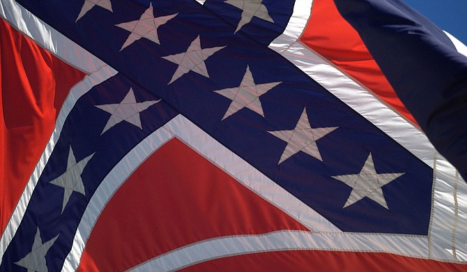 Novelist Michael Farris Smith writes that Mississippi officials should change the Mississippi flag immediately as the nation reckons with systemic racism and history. “It’s offensive, and it’s embarrassing, and it continues to make Mississippi look like it lives on the back end of civilization. Enough,” he writes. Photo courtesy Flickr/Stuart Seeger