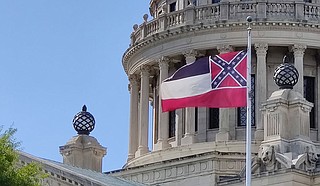 The Southeastern Conference is considering barring league championship events in Mississippi unless the state changes its Confederate-based flag. Photo by Nick Judin