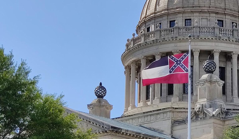 The Hinds County Democratic Executive Committee is calling upon Gov. Tate Reeves, Lieutenant Gov. Delbert Hosemann, and the Mississippi Legislature to immediately halt the use of white supremacist, Confederate symbolism on the official state flag. Photo by Nick Judin