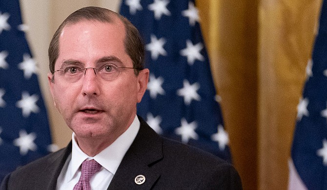 In March, dozens of anti-abortion advocates signed a letter to HHS Secretary Alex Azar in which they called for halting abortion procedures during the pandemic. Official White House Photo by Tia Dufour