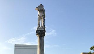 Neshoba County’s rebel soldier stares at a law office and other businesses from his perch on the courthouse lawn. It’s time for him to go. Photo by Donna Ladd