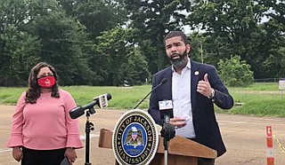 Mayor Chokwe A. Lumumba stands beside Bailey Avenue yesterday to announce the commencement of its repavement. Photo courtesy City of Jackson