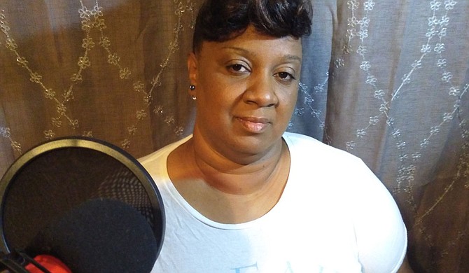 Latanya Shanks prays during a recording of “SPEAK.” Photo courtesy Latanya Shanks