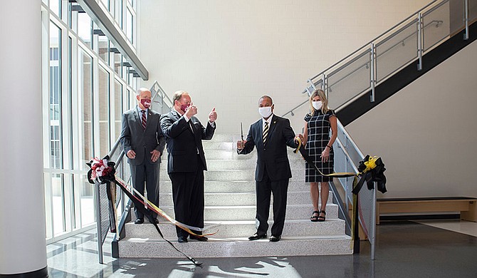 Mississippi State University and the Starkville Oktibbeha School District recently established the new Partnership Middle School at MSU. MSU and SOSD officials held a ribbon-cutting ceremony on Tuesday, Aug. 4. Photo courtesy Megan Bean/MSU