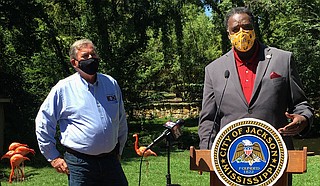 Jackon’s Director of Parks and Recreation Ison B. Harris Jr. speaks Friday about zoo-reopening efforts. Zoo Interim Director David Wetzel stands besides him. Photo by Kayode Crown