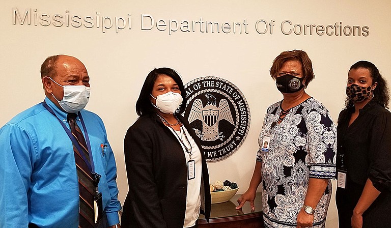 (left to right) Dr. Zein Mohamad, Felicia Graham, Willie Chaffier, and Chanel Delandro. Photo courtesy MDOC