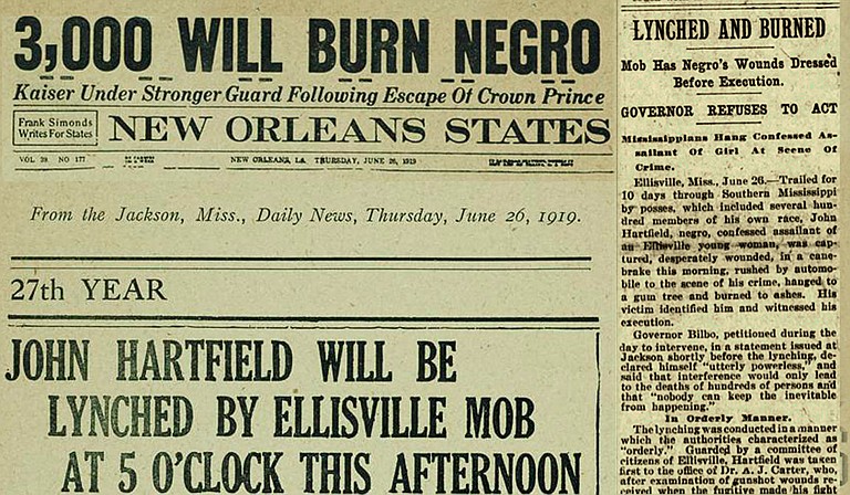 Southern newspapers, including the Jackson Daily News, announced the lynching of John Hartfield in Ellisville before it happened, probably helping increase the crowds that watched and later mailed postcards about his brutal lynching. Hartfield was accused of sexual assault of a white woman, but was offered no due process during the Red Summer of 1919 when white people were murdering and brutalizing Black people across the U.S., as well as burning their homes and businesses. Clippings: Newspapers.com