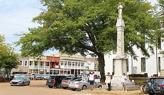 Protesters in Oxford, Miss., stood in opposition to systemic racism and the Confederate monument that towers over the lawn of the Lafayette County Courthouse on Saturday, Sept. 6, 2020. Photo by Christian Middleton