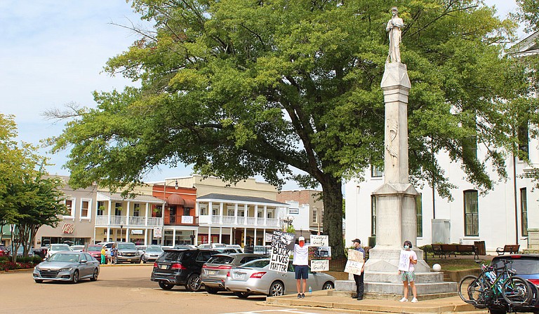 Protesters in Oxford, Miss., stood in opposition to systemic racism and the Confederate monument that towers over the lawn of the Lafayette County Courthouse on Saturday, Sept. 6, 2020. Photo by Christian Middleton