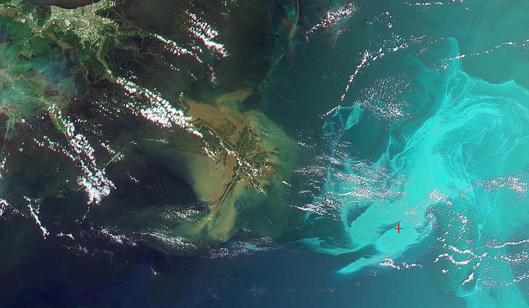 A Mississippi group has approved four projects to restore coastal areas damaged by the 2010 Deepwater Horizon oil spill in the Gulf of Mexico, Gov. Tate Reeves said Thursday. Photo courtesy NASA