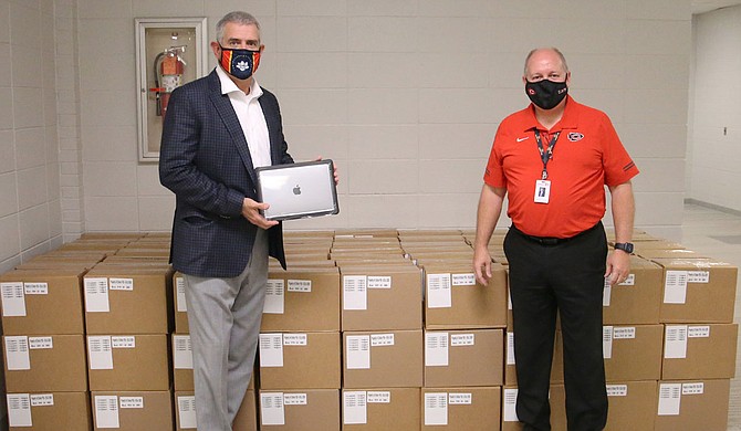 The state Department of Education has delivered about 325,000 laptop computers or tablets to public schools in recent weeks. The devices were purchased with part of the coronavirus relief money that Mississippi received from the federal government. Photo courtesy Mississippi Department of Education