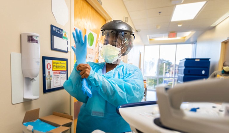 Jasmine Watson is a registered nurse at the University of Mississippi Medical Center’s 
2 North unit, which is consumed entirely with COVID-19 patients. The immense stress of the pandemic is a constant pressure on Watson and her colleagues. Photo courtesy UMMC Communications