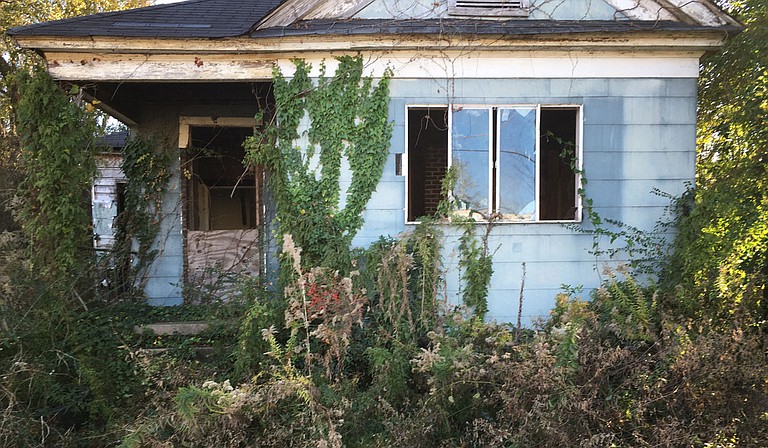Decaying property dots many Jackson neighborhoods.  Many have absentee owners including the State of Mississippi. Photo by Kayode Crown