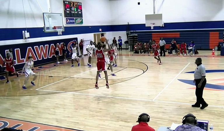 The Forest Hill Patriots, in red, battle with Madison Central Jaguars on Dec. 28, 2020, in a basketball game at Callaway High School’s gymnasium. Screenshot courtesy The Geeker Report Podcast