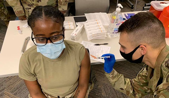 Mississippi reported more than 3,000 new coronavirus cases Wednesday, a single-day high in the state. Health officials warned that they expect worse to come, partly because of holiday gatherings. Photo courtesy Mississippi National Guard